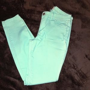 Aqua colored skinny jeans
